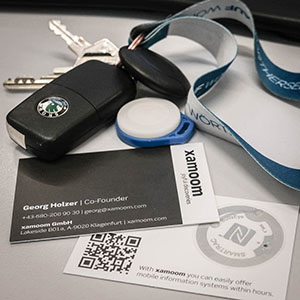 Business cards with NFC and iBeacon