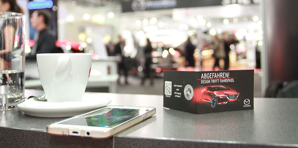 Smartphone with interactive calendar at Mazda booth